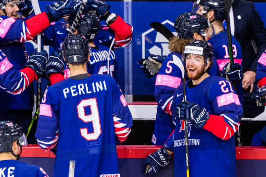 Brett Perlini and Mike Hammond of Great Britain celebrates
