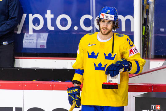 Mario Kempe of Sweden is awarded Player of the Match