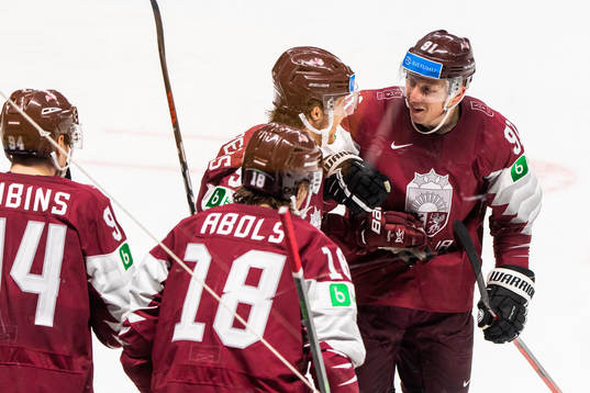 Renars Krastenbers and Ronalds Kenins of Latvia celebrate