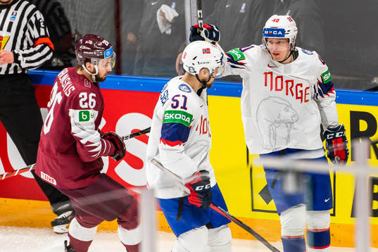 Mats Rosseli Olsen and Ken Andre Olimb of Norway celebrate
