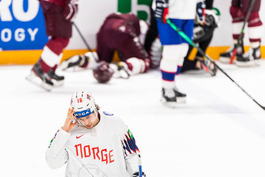 Magnus Brekke Henriksen of Norway looks dejected