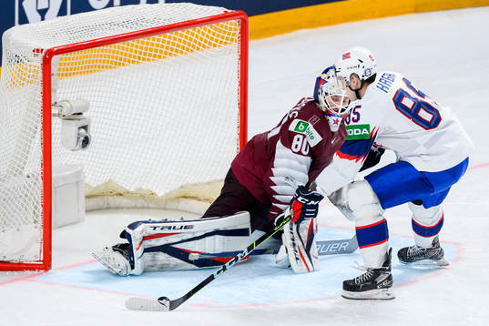 Michael Haga of Norway scores the game winning shoot out