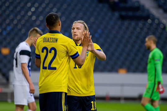Robin Quaison and Emil Forsberg of Sweden celebrate the 1-0