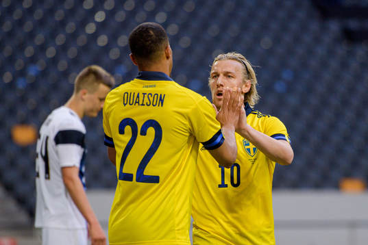 Robin Quaison and Emil Forsberg of Sweden celebrate the 1-0