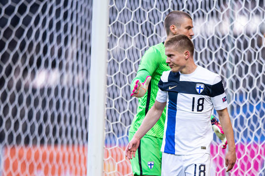 Goalkeeper Jesse Joronen and Jere Uronen of Finland
