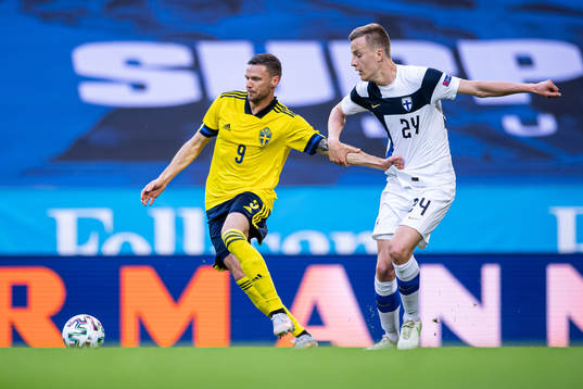 Marcus Berg of Sweden and Robert Ivanov of Finland