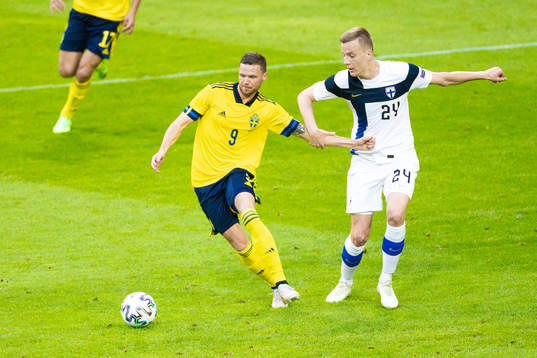 Marcus Berg of Sweden and Robert Ivanov of Finland