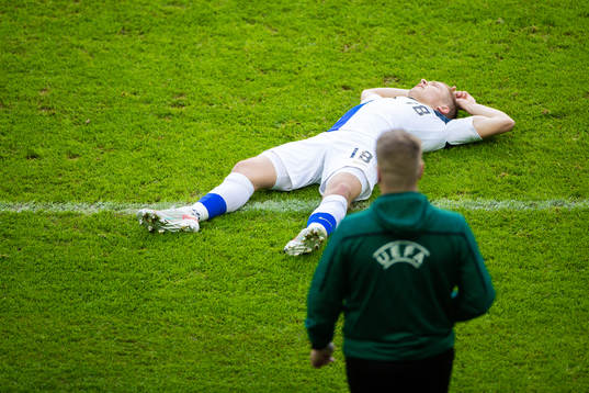 Jere Uronen of Finland looks dejected
