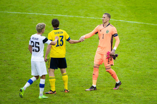 goalkeeper Robin Olsen of Sweden celebrates