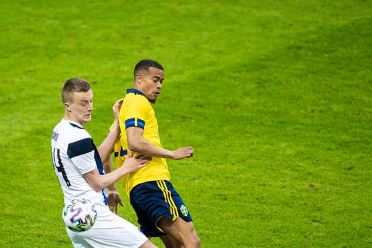 Robert Ivanov of Finland and Robin Quaison of Sweden