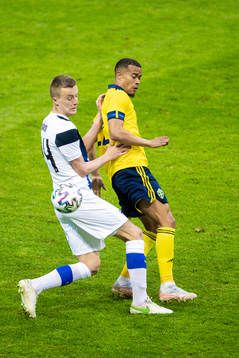 Robert Ivanov of Finland and Robin Quaison of Sweden