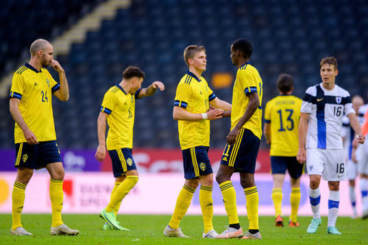 Joakim Nilsson and Alexander Isak of Sweden celebrate