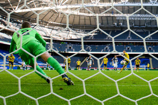 Sebastian Larsson of Sweden scores the 2-0 goal behind