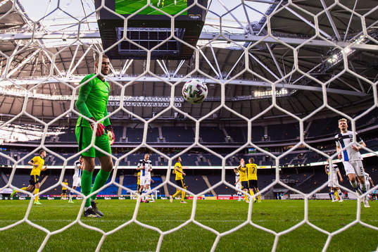 Goalkeeper Jesse Joronen of Finland looks dejected