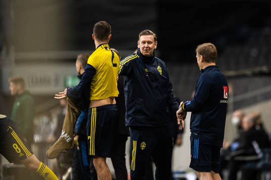 Assistant coach Peter Wettergren and Mikael Lustig of Sweden