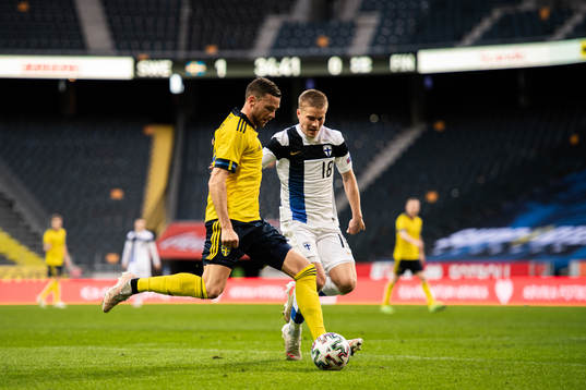 Marcus Berg of Sweden and Jere Uronen of Finland