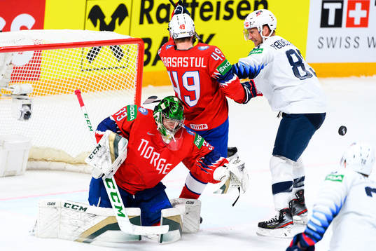 Justin Abdelkader of USA against goalkeeper Henrik