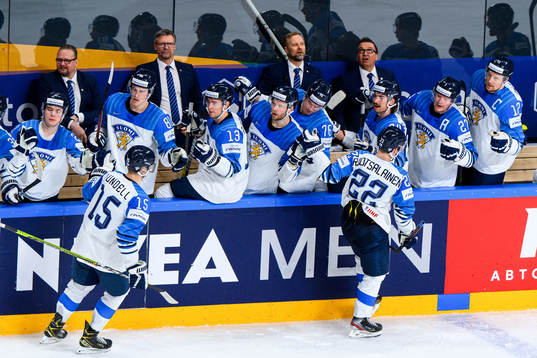 Anton Lundell and Arttu Ruotsalainen of Finland celebrate