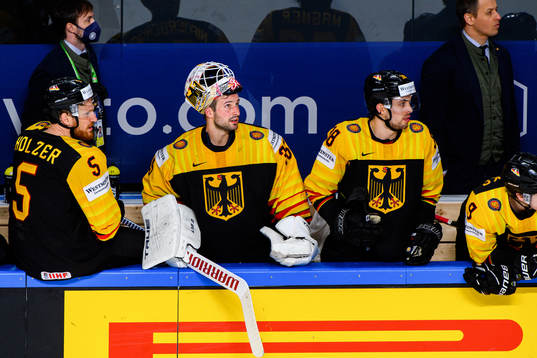 Goalkeeper Mathias Niederberger of Finland looks dejected