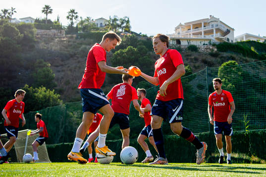 Martin Ødegaard and Jonas Svensson of the Norwegian