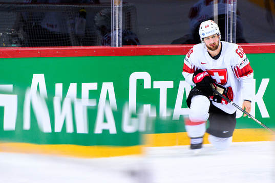 Tristan Scherwey of Switzerland looks dejected