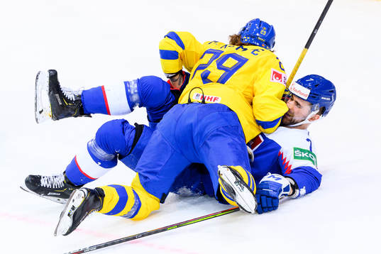 Mario Kempe of Sweden and Mario Grman of Slovakia
