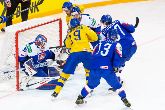 Marcus Sörensen of Sweden scores 1-1 behind goalkeeper