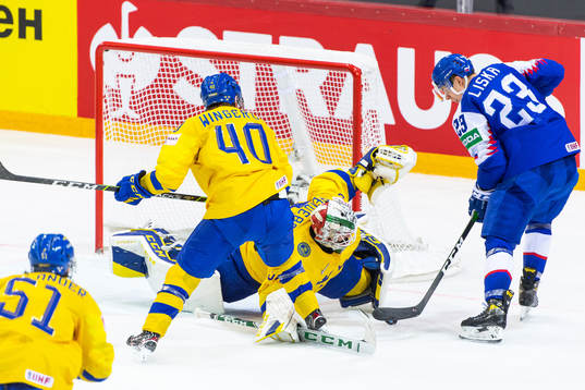 Andreas Wingerli and goalkeeper Adam Reideborn of Sweden
