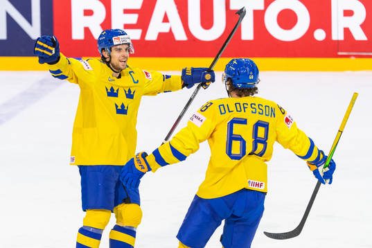 Henrik Tömmernes celebrates with Victor Olofsson of Sweden