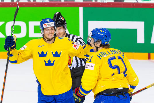 Isac Lundström and Filip Hållander of Sweden celebrate