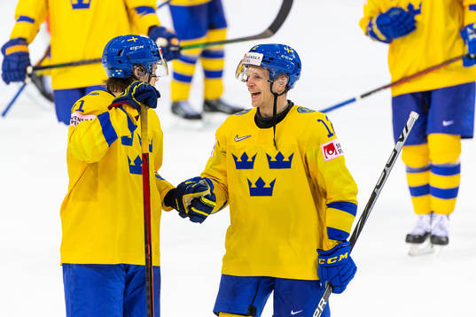 Filip Hållander and Max Friberg of Sweden celebrate
