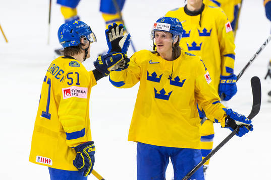 Filip Hållander and Marcus Sörensen of Sweden celebrate