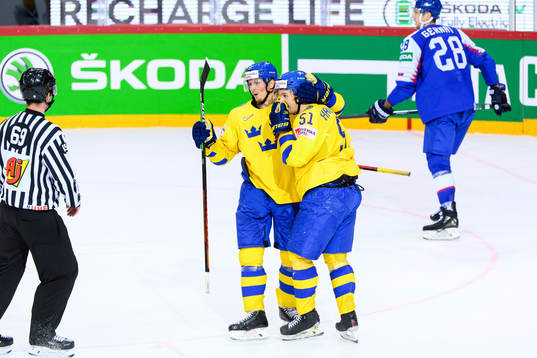 Isac Lundström and Filip Hållander of Sweden celebrate