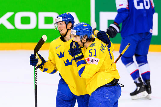 Isac Lundström and Filip Hållander of Sweden celebrate