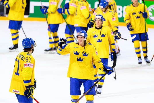 Filip Hållander and Marcus Sörensen of Sweden celebrate