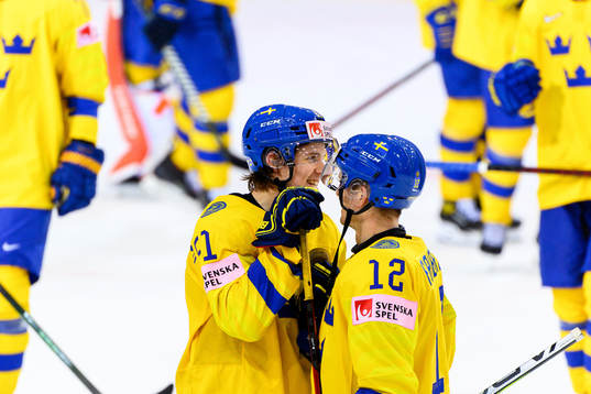 Filip Hållander and Max Friberg of Sweden celebrate