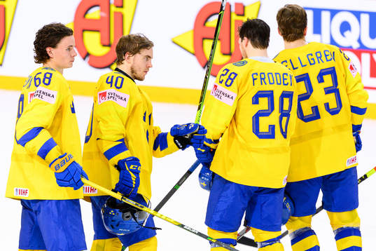 Victor Olofsson and Andreas Wingerli of Sweden celebrate