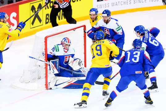 Marcus Sörensen of Sweden scores the 1-1 goal behind