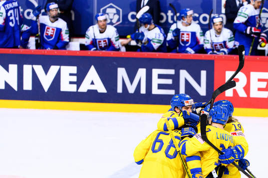 Henrik Tömmernes and Victor Olofsson of Sweden celebrate
