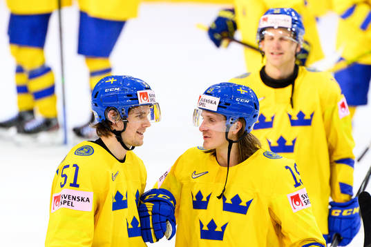 Filip Hållander and Marcus Sörensen of Sweden celebrate