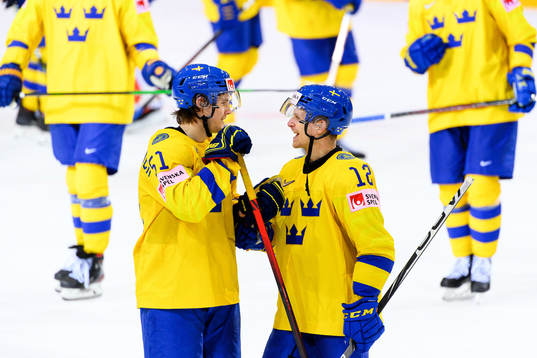 Filip Hållander and Max Friberg of Sweden celebrate