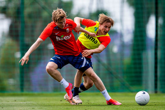 Jens Petter Hauge and Jonas Svensson of the Norwegian