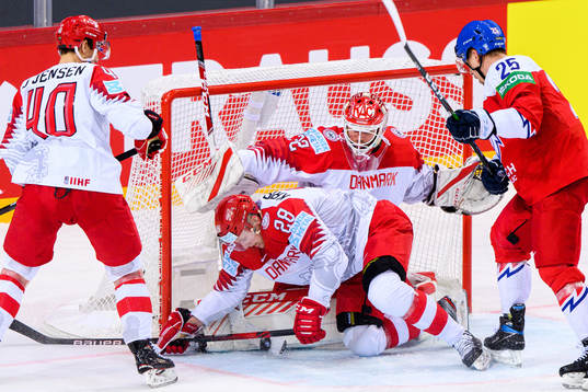 Emil Kristensen and goalkeeper Sebastian Dahm of Denmark