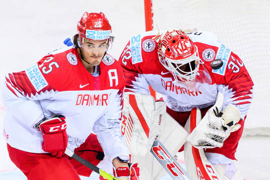 Oliver Lauridsen and goalkeeper Sebastian Dahm of Denmark