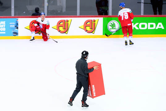 A steward removes the price table