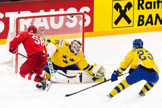 Goalkeeper Adam Reideborn of Sweden and Anton Slepyshev of