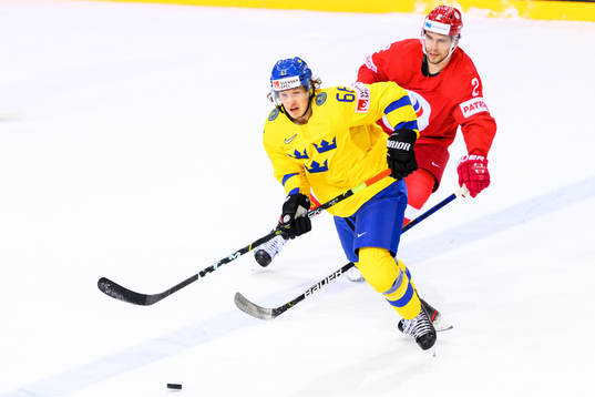 Rickard Rakell of Sweden and Artyom Zub of Russia