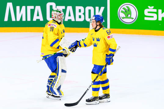 Goalkeeper Adam Reideborn and Jonathan Pudas of Sweden