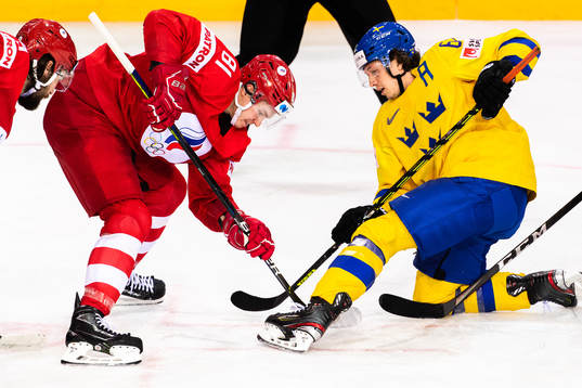 Vladislav Kamenev of Russia  and Rickard Rakell of Sweden