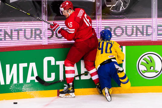 Nikita Zadorov of Russia and Andreas Wingerli of Sweden
